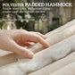 Close-up of cream hammock fabric with padded cushioned surface