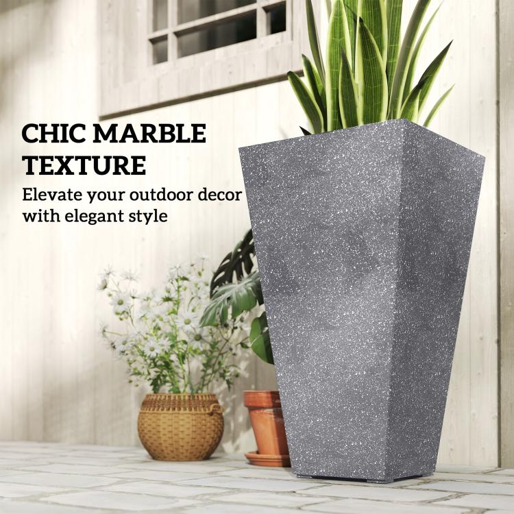 Tall gray tapered plastic planter with green plant, marble-textured surface