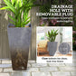 Tall gray tapered plastic planter with removable drainage plug detail at bottom