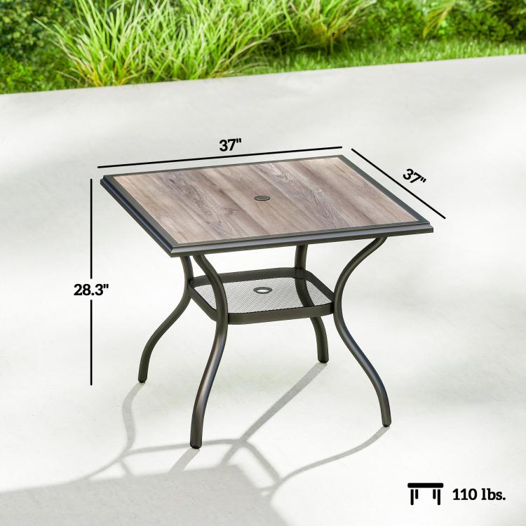 Square outdoor dining table, gray faux-wood top with umbrella hole, black legs