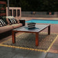 Outdoor rug carpet with black-and-white geometric pattern and glowing LED edge lighting