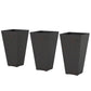 Three tall taper planters in dark speckled plastic with open tops