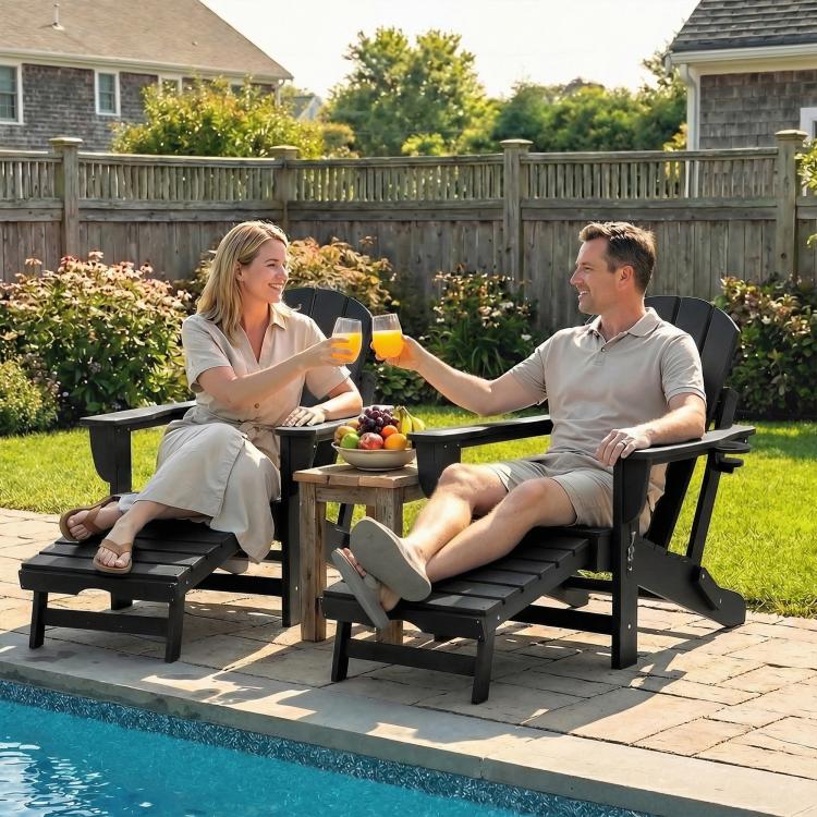Black folding adirondack chairs with retractable ottomans and built-in cup holders