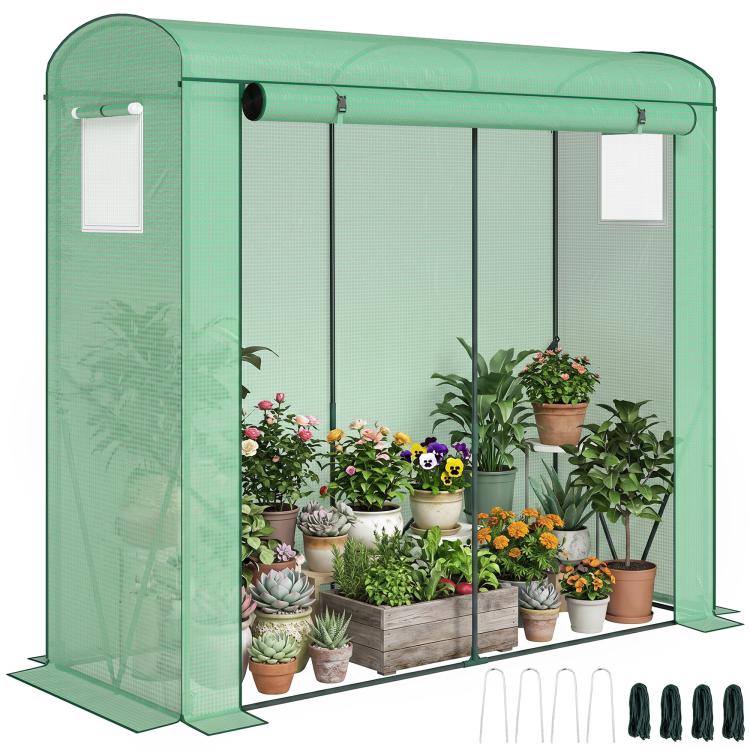 Portable mini greenhouse with green PE cover, roll-up door, and mesh windows for plants