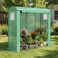 Green portable mini greenhouse with mesh sides and roof over potted flowers