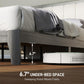 Low gray platform bed with open under-bed space