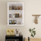 White wall cabinet with two doors open, stocked shelves for bathroom pantry items