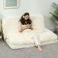 Cream white plush floor sofa bed with wide base and padded backrest