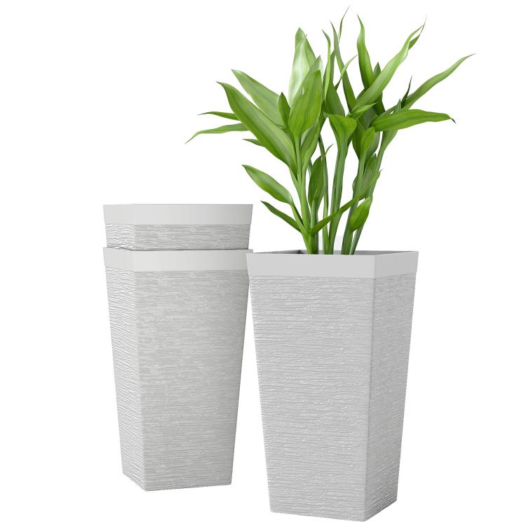 Set of three white stone-finish outdoor planters, tapered square pots
