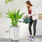 White tapered stone-finish planter with drainage hole, shown with watering can