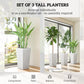 Set of three tall white stone-finish planters, stackable tapered pots