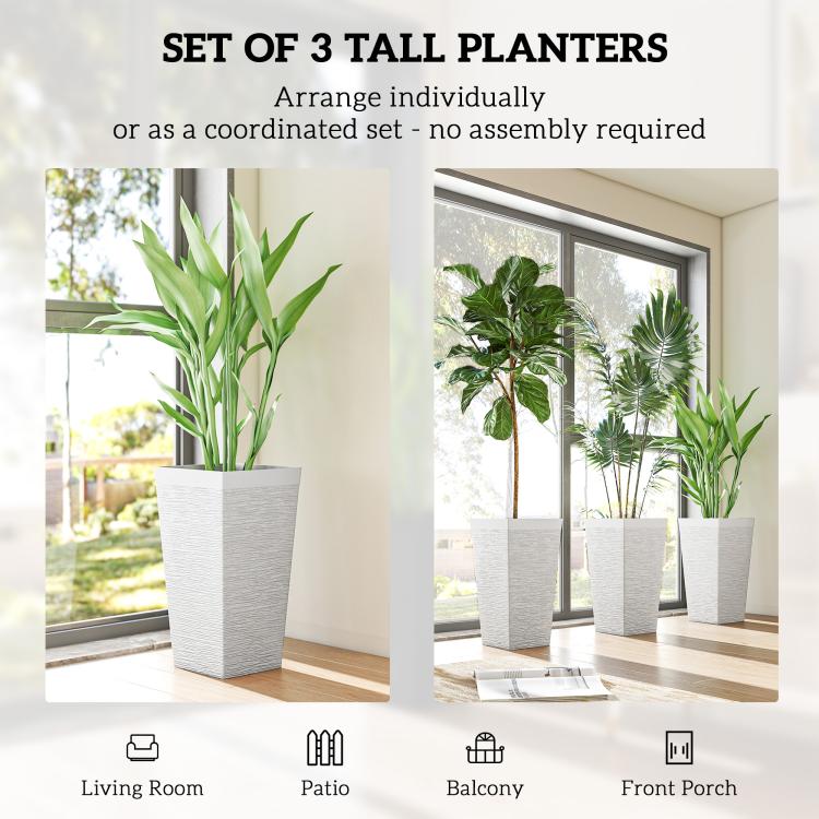 Set of three tall white stone-finish planters, stackable tapered pots