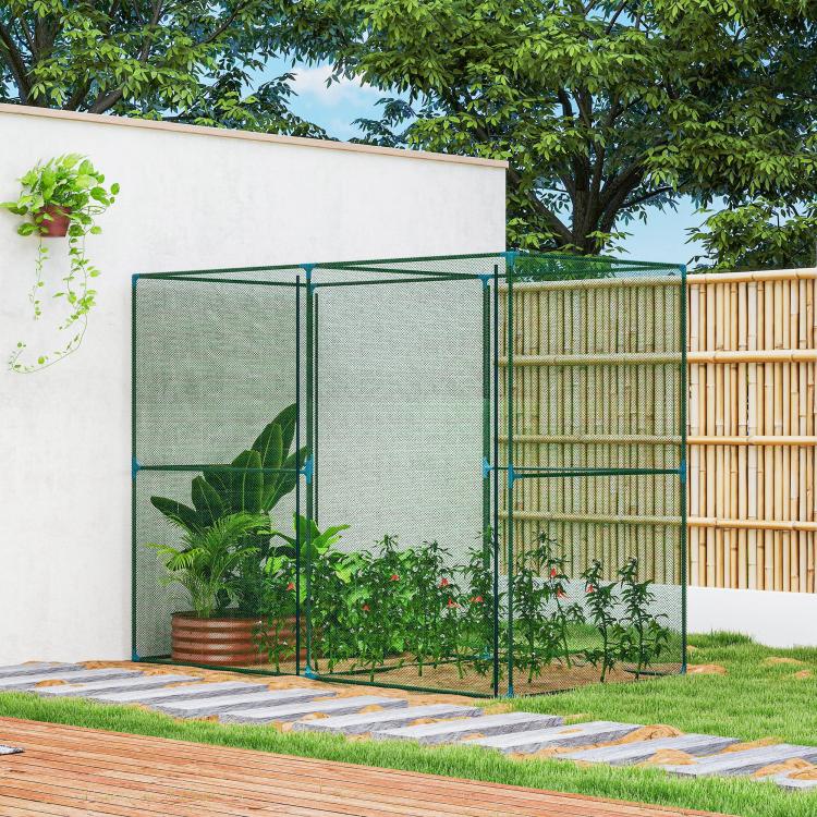 Green walk-in crop cage with mesh panels to protect plants from animals