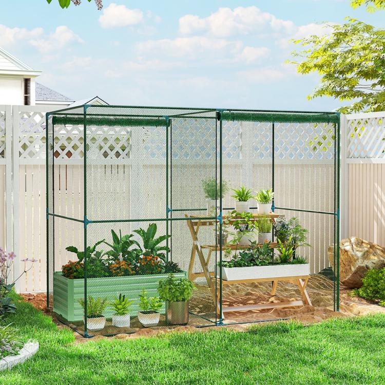 Green mesh plant protection cage with front frame and interior potted plants