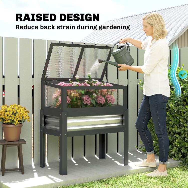 Gray raised planter box with mini greenhouse for gardening, open lid position