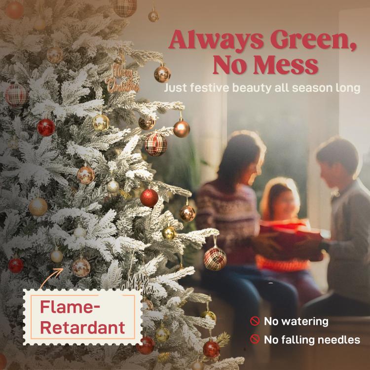 Frosted artificial Christmas tree with mixed red and gold ball ornaments on branches