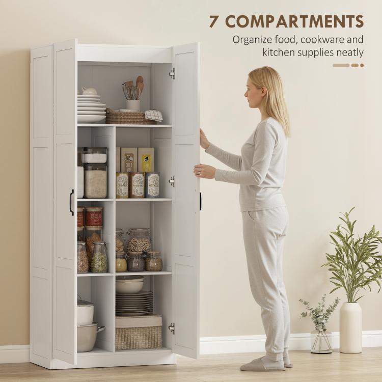 White tall pantry cabinet open, showing organized shelves for kitchen cookware and food