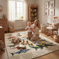 Dinosaur play mat on living room floor with colorful tracks and numbers.