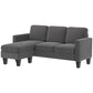 Dark gray L-shaped sofa with chaise extension, padded arms and back cushions.