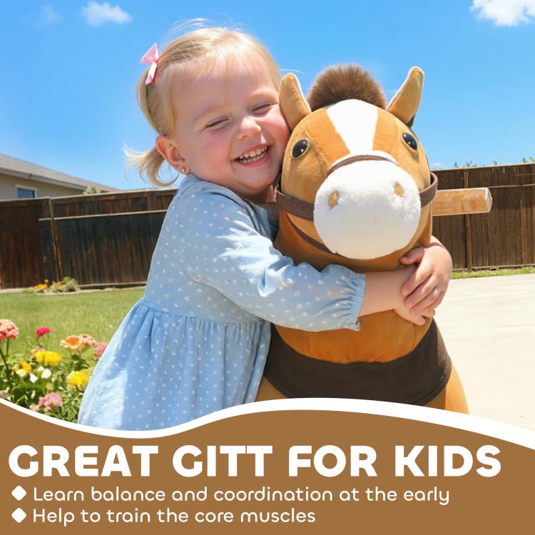 Child hugging a plush rocking horse with tan face and dark brown saddle, outdoor