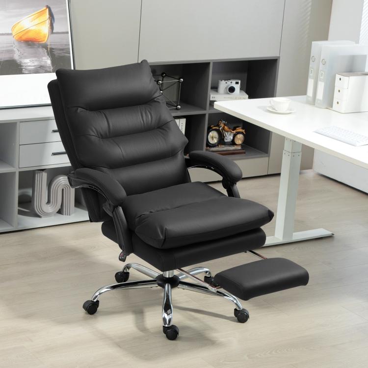 Black massage office chair with footrest and chrome swivel base.