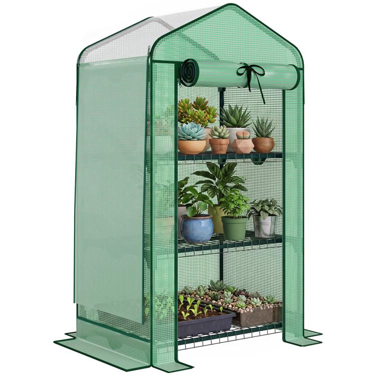 Green mini greenhouse with screened walls, roll-up door, and metal wire shelves inside