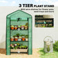 Green mini greenhouse with three-tier wire plant stand inside screened frame