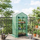Green portable mini greenhouse with roll-up door, screened walls, and open front access