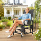 Black mesh gliding rocking lounge chair with wide arms and connected base struts