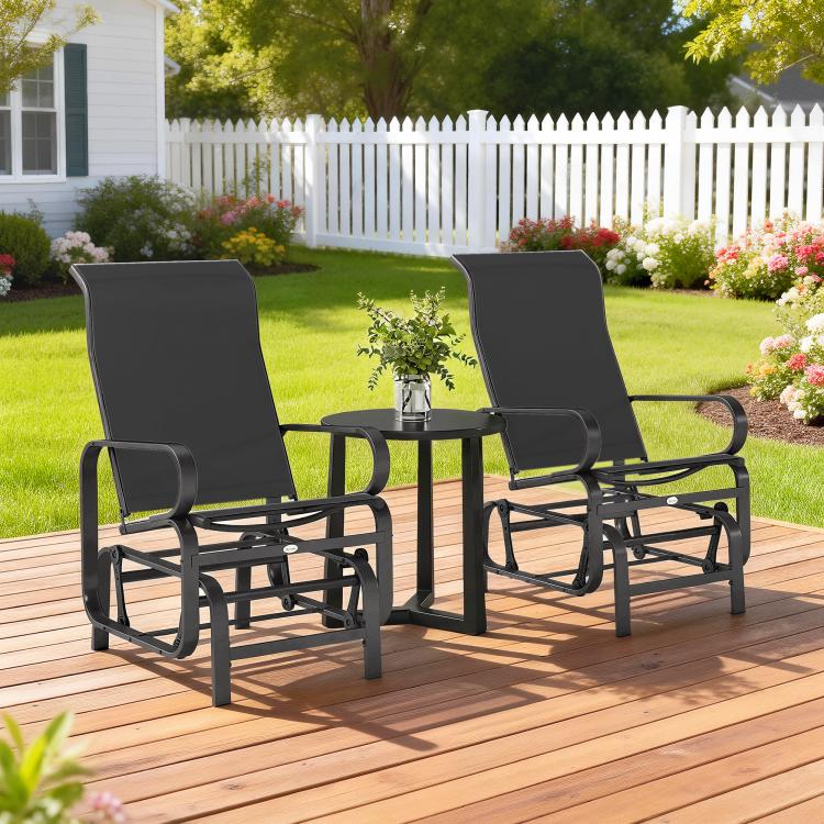 Pair of black mesh rocking glider chairs with metal frame on wooden deck