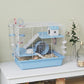 Blue 3-level hamster cage with exercise wheel, tunnel sections, and house shelter