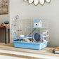 Blue hamster cage on wooden floor with ramps, house hut, wheel, and hanging water bottle