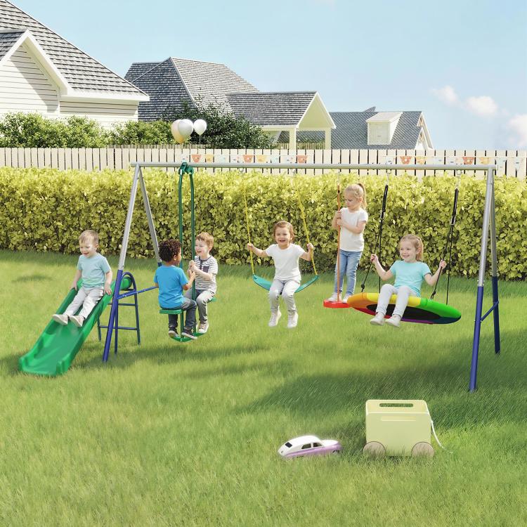 Outdoor kids swing set with green slide and several hanging swing attachments