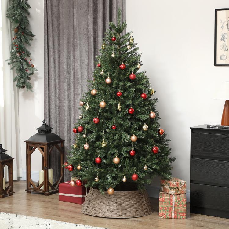 Woven Christmas tree collar skirt in taupe/coffee, shown under an indoor tree