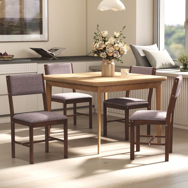 Dining chair set with taupe upholstered seats and brown wood frames around a wooden table