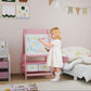 Pink kids art easel with whiteboard, double panels and storage bins; child drawing.