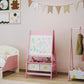 Pink kids double-sided art easel with whiteboard panel and storage drawers, standing indoors.