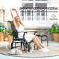 Black patio glider chair with smooth rocking base and ottoman footrest
