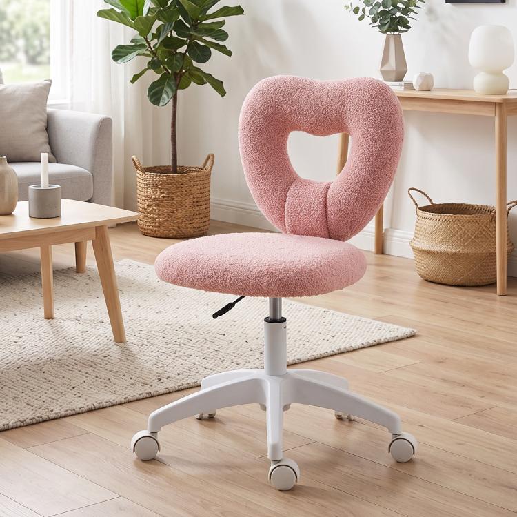 Pink teddy fleece armless swivel chair with heart cutout back and plush round seat on casters