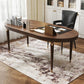 Rectangular abstract area rug with light beige base and brown/gray distressed pattern