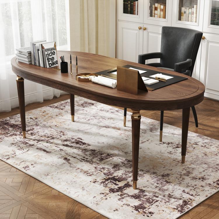 Rectangular abstract area rug with light beige base and brown/gray distressed pattern