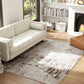 Abstract area rug in light tones with dark brown distressed pattern, 4x6