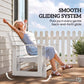 Distressed white slatted glider bench with armrests and rocking base, person seated