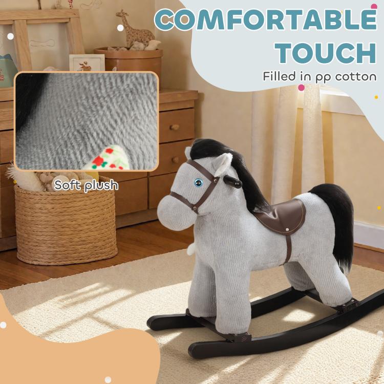 Gray plush rocking horse ride-on with brown saddle and soft plush body on rockers
