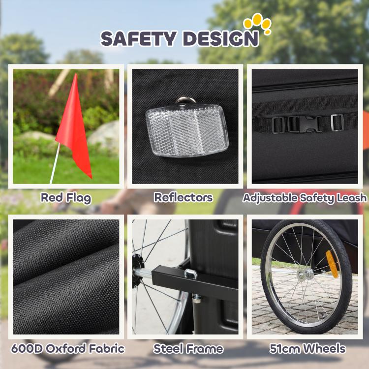 Dog bike trailer with red safety flag, reflectors, and adjustable safety leash