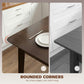 Rectangular dining table with rounded corners and dark tabletop, shown with corner detail