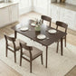Rectangular dark brown dining table with four chairs and dinnerware centerpiece