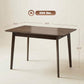Dark brown rectangular dining table with tapered legs and smooth tabletop
