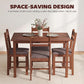 Light brown dining table set with four upholstered chairs, chairs tucked under