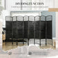 Black 8-panel privacy screen creating a semi-circular enclosed space with grid panels